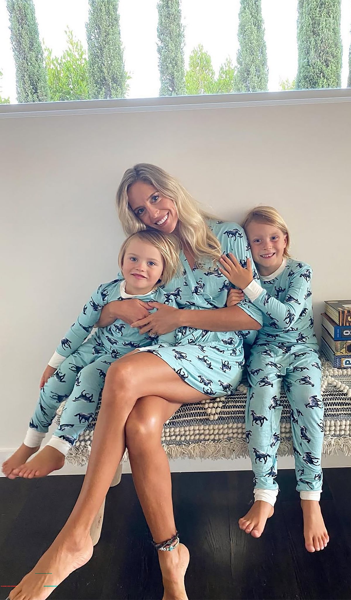 Horse Emerson Kids 2-Piece Pant PJ worn by little boys sitting on bench with their mom.