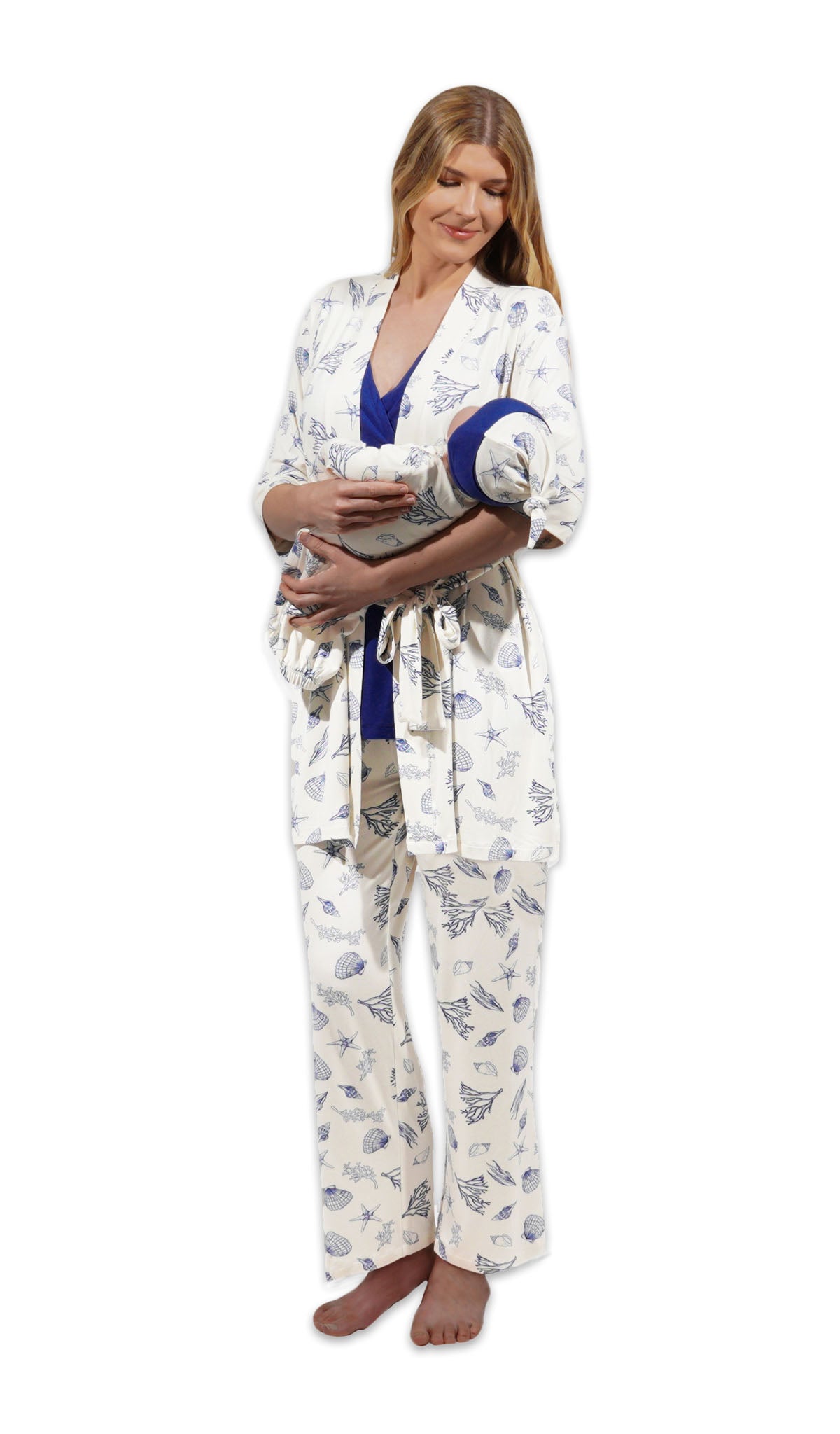 Coastal Analise 5-Piece Set. Woman wearing 3/4 sleeve robe, tank top and pant while holding a baby wearing baby gown and knotted baby hat.