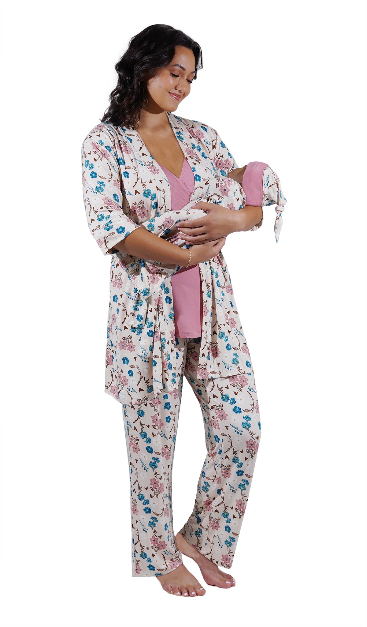 Magnolia Analise 5-Piece Set. Woman wearing 3/4 sleeve robe, tank top and pant while holding a baby wearing baby gown and knotted baby hat.