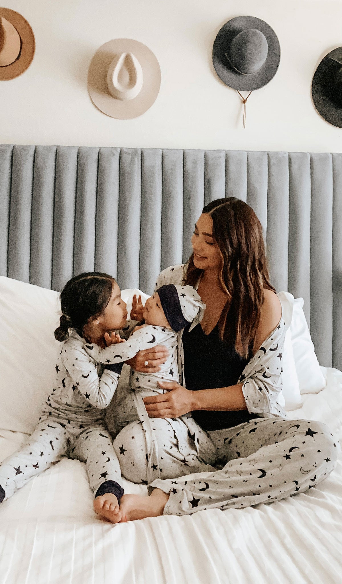 Twinkle Night Emerson Kids 2-Piece Pant PJ worn by little girl sitting next to her mom and baby brother.