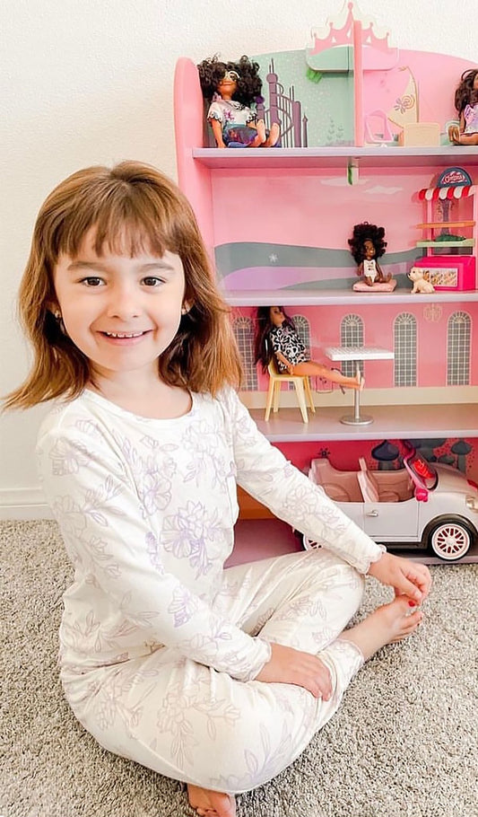 Bali Charlie Kids 3-Piece Pant PJ worn by little girl playing with her doll house.  Headwrap not shown.
