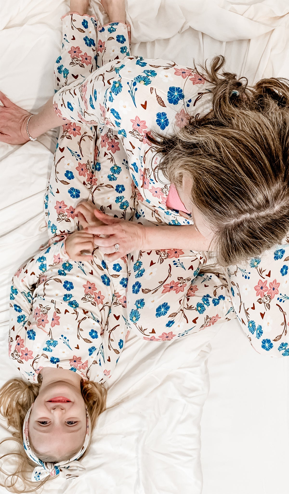 Magnolia Charlie Kids 3-Piece Pant PJ worn by little girl laying in bed with her mom.