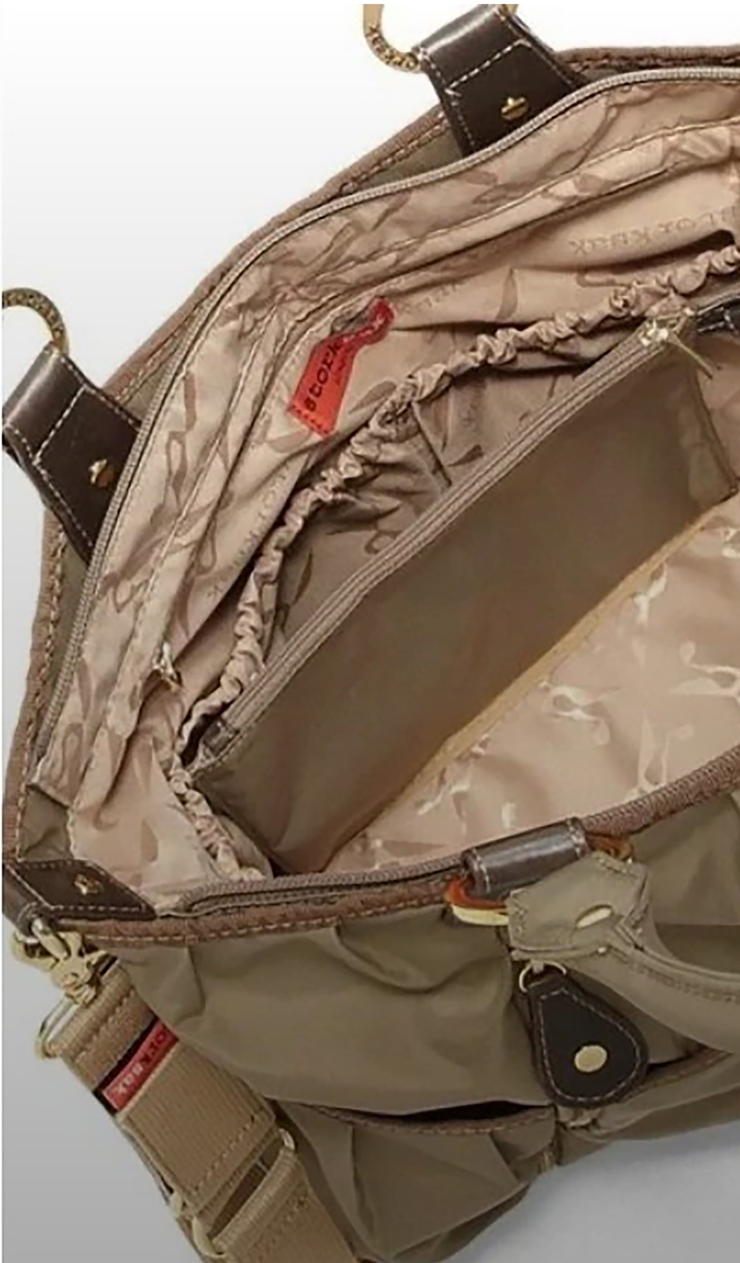 Storksak Olivia Diaper Bag detail shot of internal pockets.