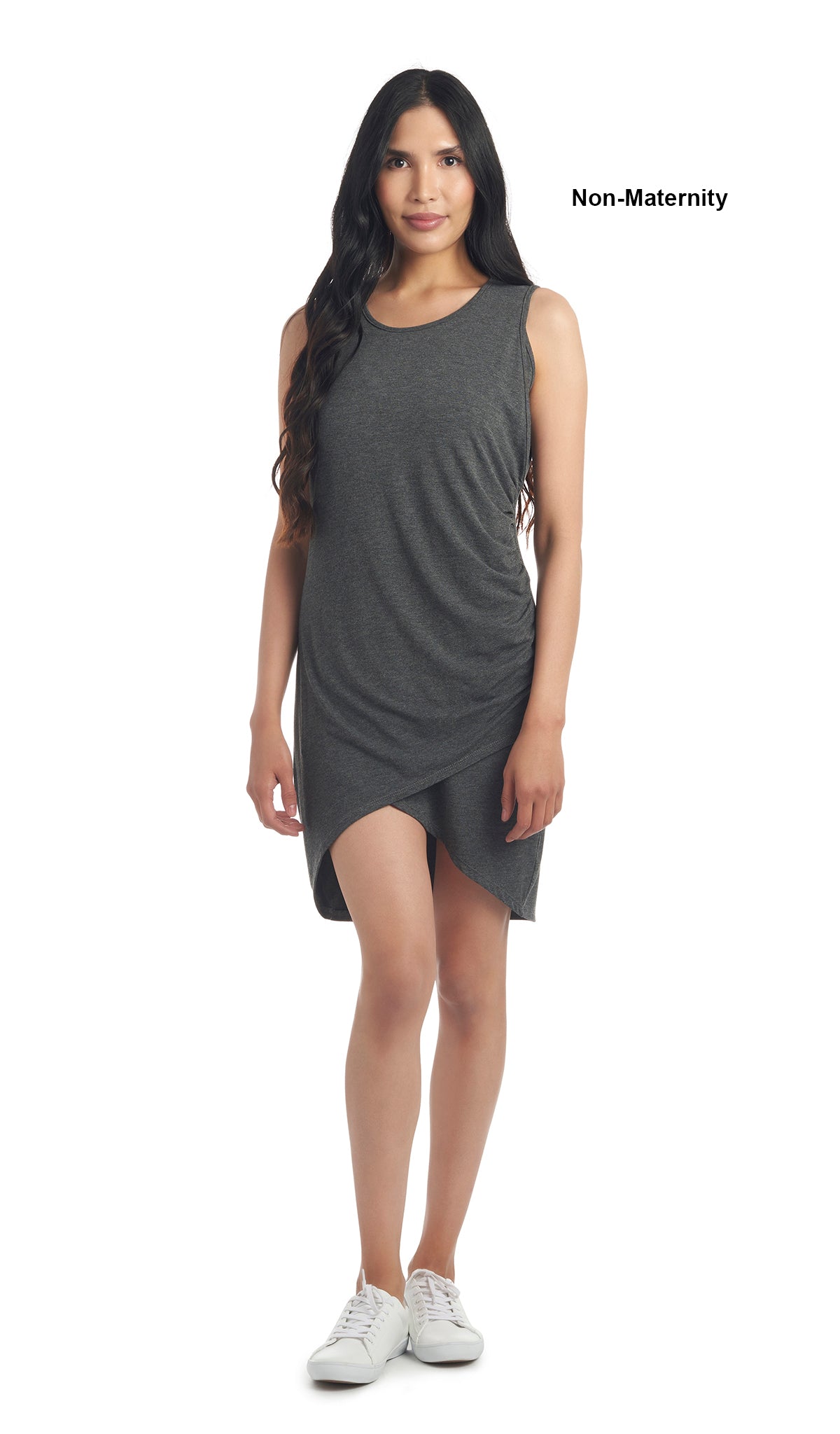 Charcoal Tamara dress worn as non-maternity style by woman standing with arms down to side.