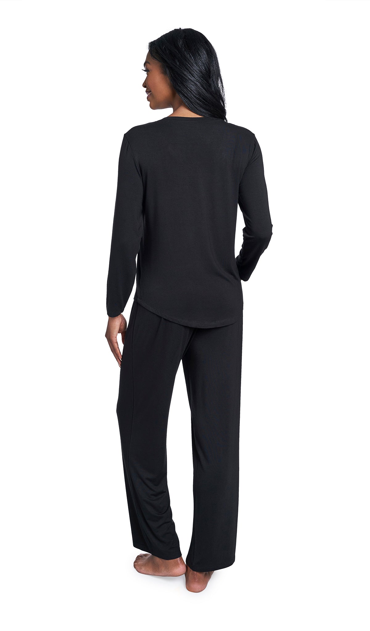 Black Laina 2-Piece Set. Back shot of woman wearing long sleeve top and pant.