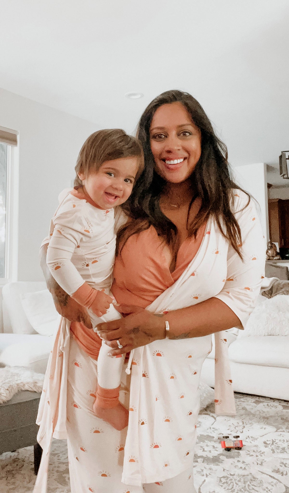 Sunrise Analise 3-Piece. Mother wearing robe, tank top and pant while holding her child, who is wearing Emerson PJ in matching print.