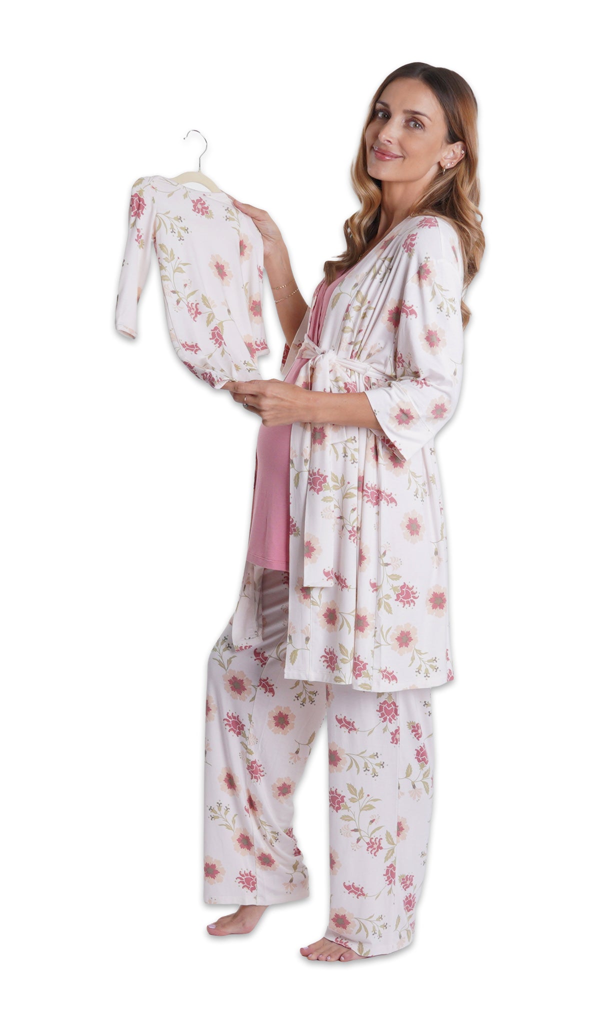 Cottage Floral Analise 5-Piece Set. Pregnant woman wearing 3/4 sleeve robe, tank top and pant while holding a baby gown on hanger.