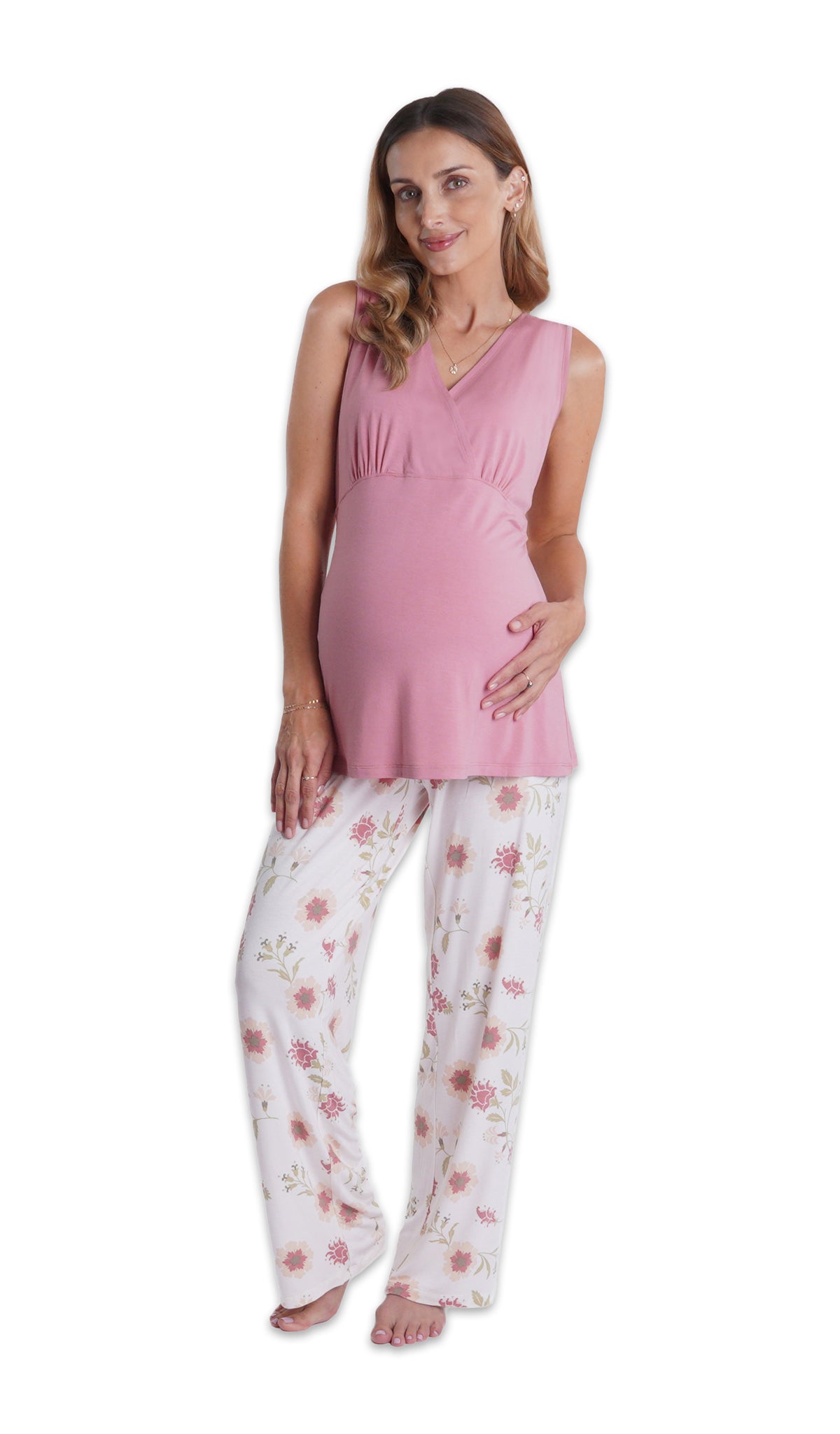 Cottage Floral Analise 5-Piece Set, pregnant woman wearing criss-cross bust tank top and pant with one hand on belly.