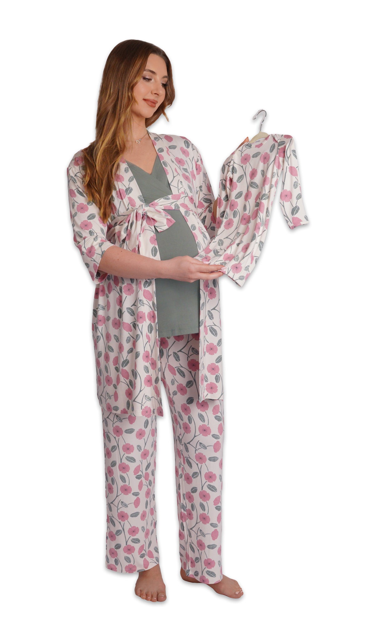Honey Bloom Analise 5-Piece Set. Pregnant woman wearing 3/4 sleeve robe, tank top and pant while holding a baby gown on hanger.