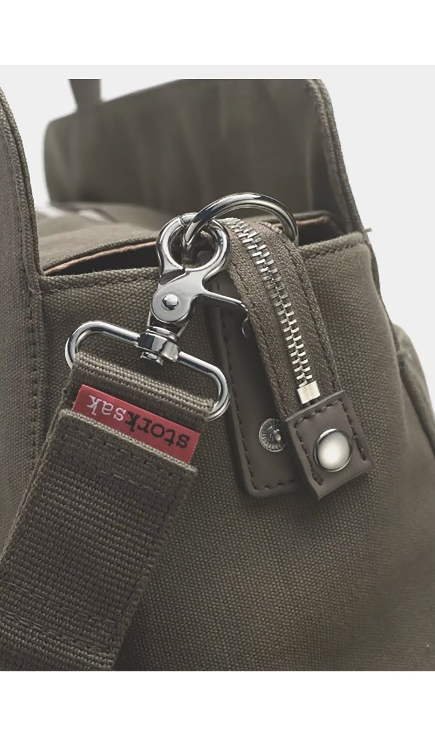 Storksak Juliette Diaper Bag Moss detail  image of the hardware.