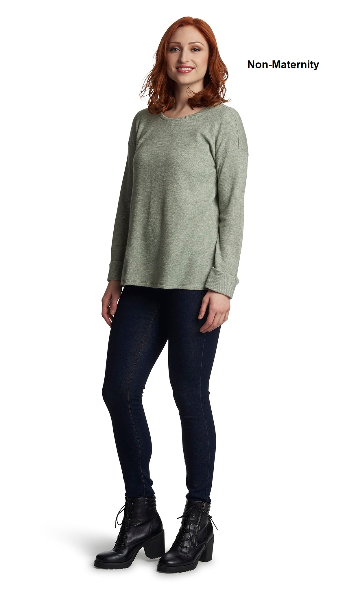 Moss Andria full length shot of sweater worn by woman as non-maternity style with dark denim jeans.